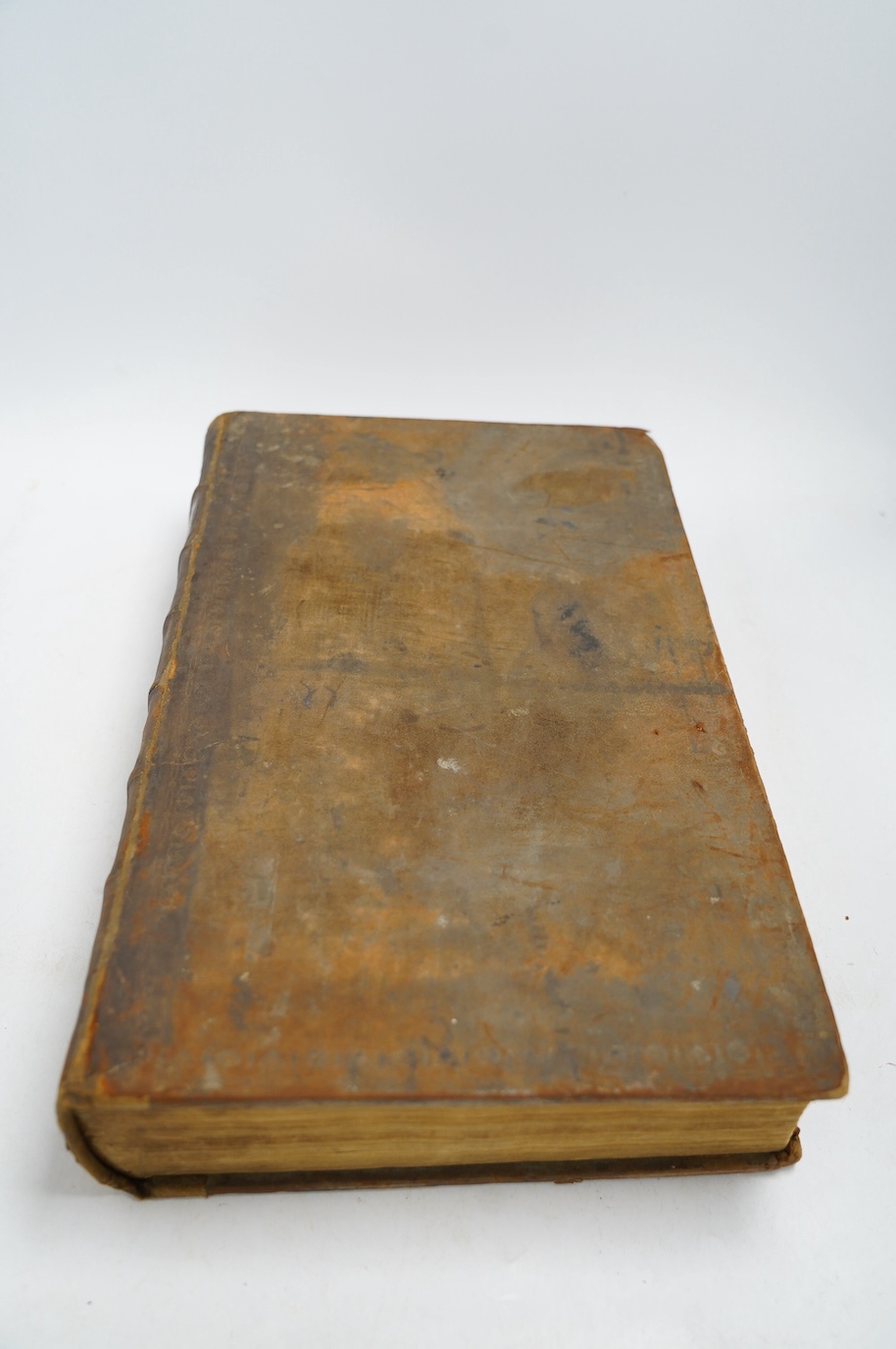 An 18th century leather bound family bible with plates. Condition - poor to fair